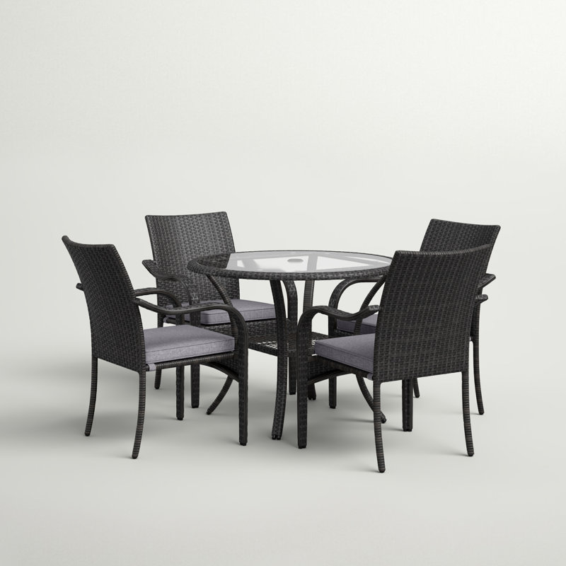 Tahirul 4 Person Round Outdoor Dining Set with Cushions